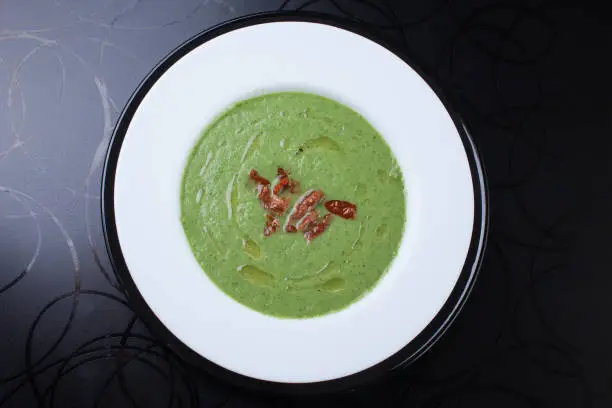 Photo of Green soup with tomatoes