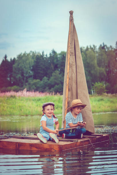 istock Children traveling on raft 639928342