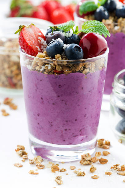 istock Blueberry dessert with granola on a white background, closeup 639928514