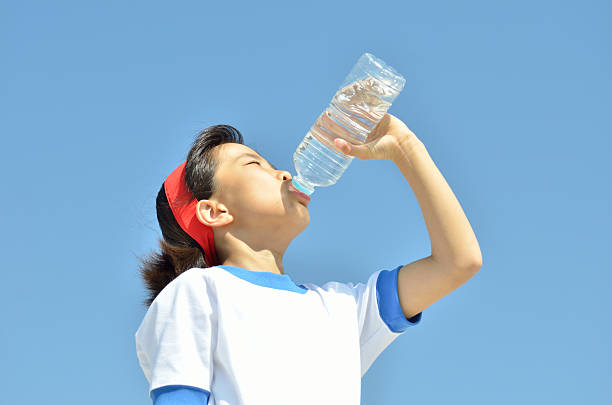 istock Japanese girl drinking water 639930460