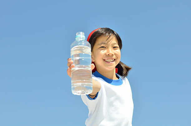 istock Japanese girl drinking water 639930504