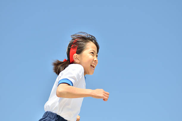 istock Japanese girl running 639931176