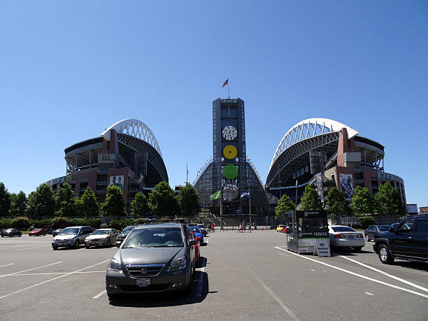 usa flag flies above centurylink, and parking lot - major league soccer imagens e fotografias de stock