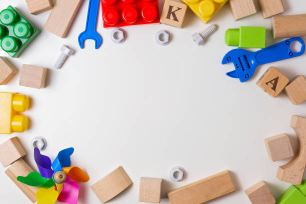 istock Children toys on white background as frame with copy space 639936330
