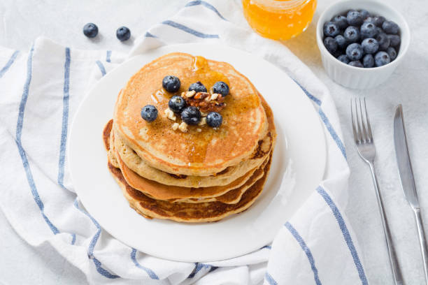 istock Pancakes with blueberries, honey and walnuts 639936598