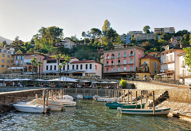 boats at waterfront in expensive resort ascona in ticino - tessin imagens e fotografias de stock