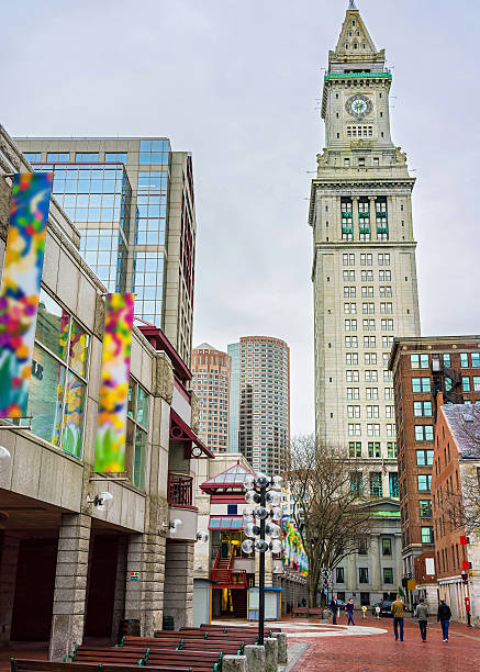Custom House Tower and Faneuil Hall Marketplace at downtown Boston Boston, USA - April 28, 2015: Custom House Tower and Faneuil Hall Marketplace at downtown Boston, Massachusetts, the United States. People on the background. alaska us state photos stock pictures, royalty-free photos & images