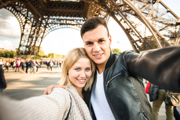istock romantic couple take a selfie in paris 639947924