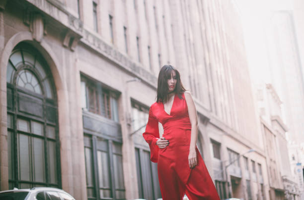 istock Beauty in red dress 639949314