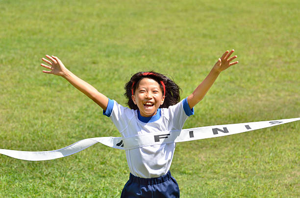 istock Japanese girl with goal tape 639949742