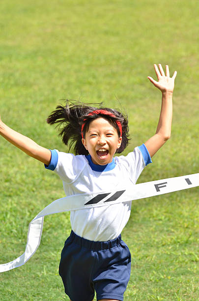 istock Japanese girl with goal tape 639949864