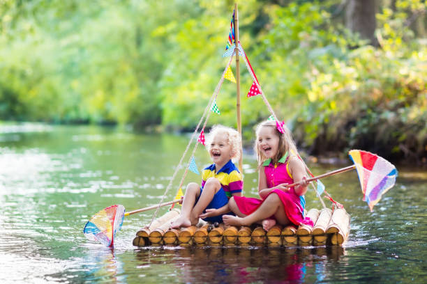 Kids on wooden raft