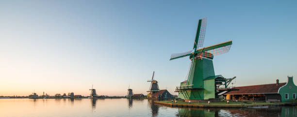istock Traditional Dutch windmills with canal close 639955010