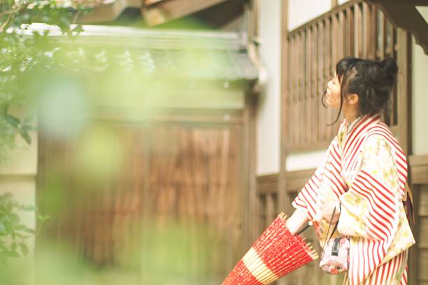 istock Woman in kimono with umbrella 639955120