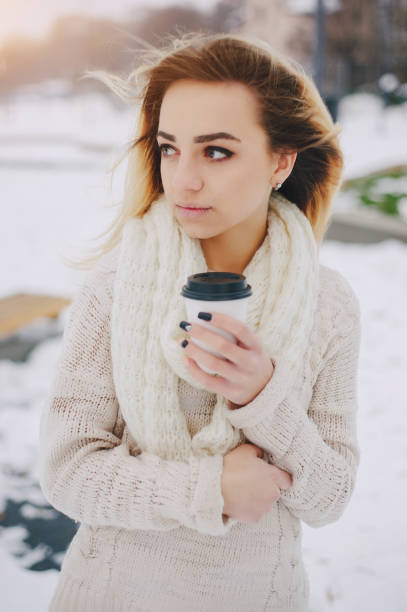 istock beautiful girl on winter walk 639955250