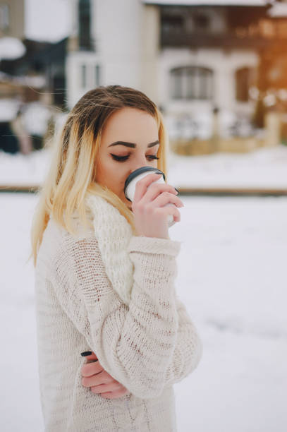 istock beautiful girl on winter walk 639955364