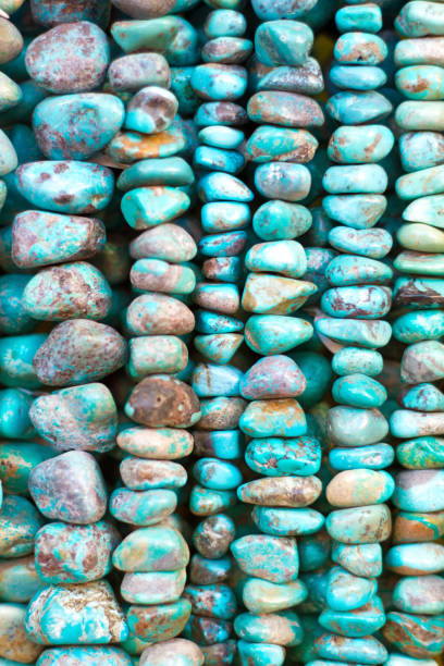 istock Turquoise Beads and Necklaces Hanging (Close-Up Full Frame) 639955908