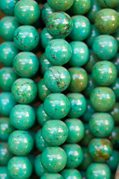 istock Turquoise Beads and Necklaces Hanging (Close-Up Full Frame) 639956210
