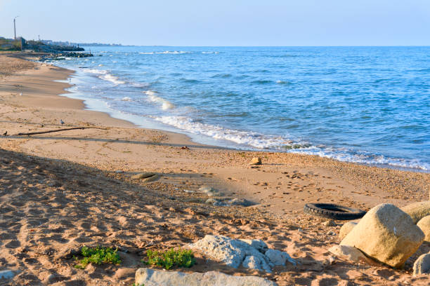 Dirty beach of the Caspian Sea. Derbent