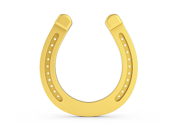 Gold horseshoe Gold horseshoe on a white background. 3D illustration. horseshoe horse luck good luck charm stock pictures, royalty-free photos & images