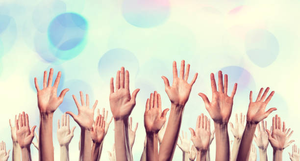 istock Group of people rise hands . Mixed media 639964940