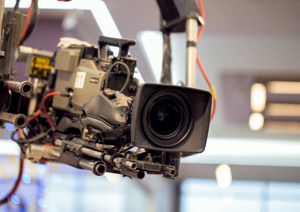 istock TV professional camera on crane shooting  show in studio decoration. 639965920