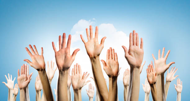 istock Group of people rise hands . Mixed media 639966642