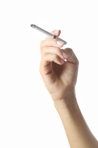 istock Studio shoot of hand holding a cigarette 639967044