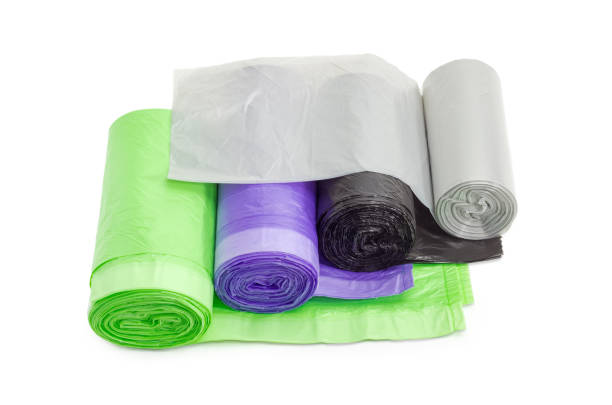 istock Plastic garbage bags in rolls of different sizes and colors 639967922