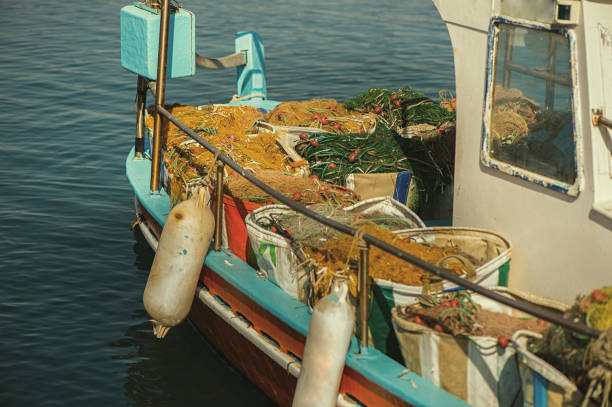 istock fishing net in a fishing boat 639968044