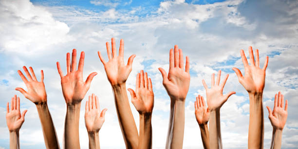 istock Group of people rise hands . Mixed media 639968274