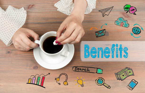 istock Benefits. Coffee cup top view on wooden table background. 639968290