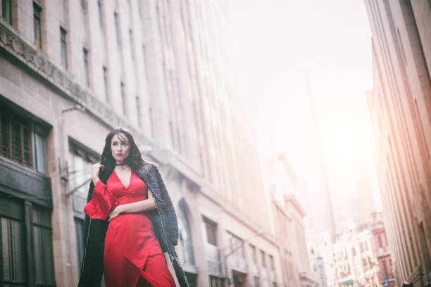 istock Lady in red dress 639973268