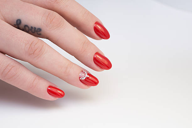 istock Perfect manicure and natural nails. Attractive modern nail art design. 639973434