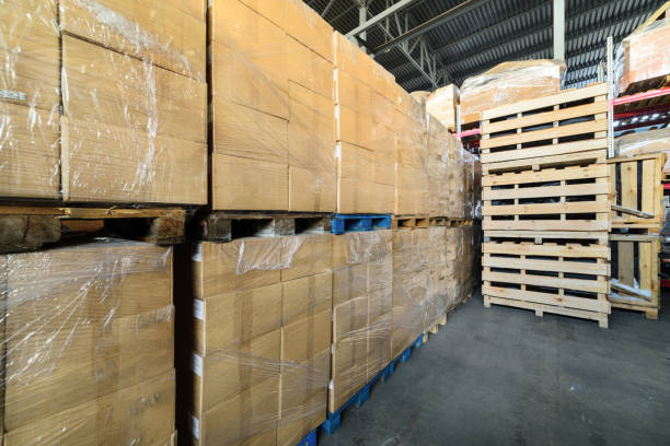 istock Cardboard boxes wrapped in stretch film. 639973744