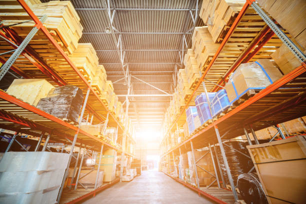 istock Long shelves with a variety of boxes and containers. 639974930