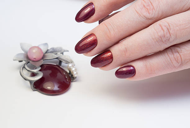 istock Perfect manicure and natural nails. Attractive modern nail art design. 639975376