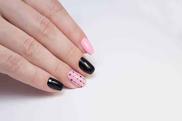 istock Perfect manicure and natural nails. Attractive modern nail art design. 639976250