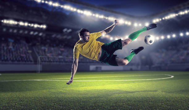 istock Soccer player at sport arena . Mixed media 639976394