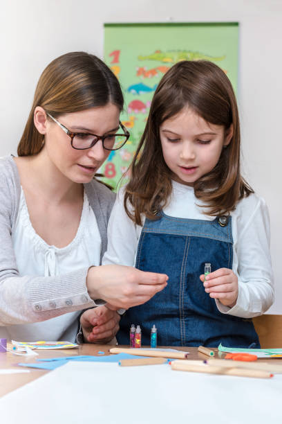 istock Mother with creative kid having fun time together 639977736