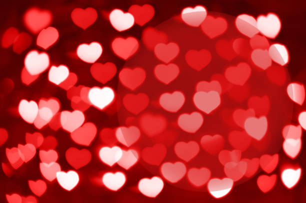 istock Red and white hearts bokeh as background with copy space 639979608