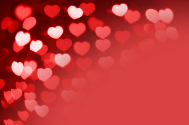 istock Red and white hearts bokeh as background with copy space 639979686