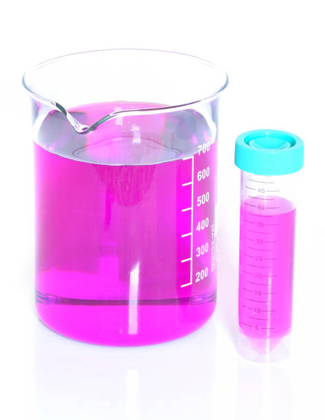 istock Chemical beaker with permanganate dissolved in water 639981118