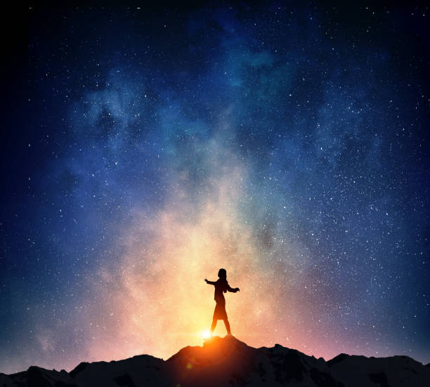 istock Businesswoman against starry sky . Mixed media 639982002
