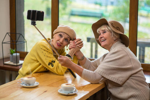 istock Women taking selfie in cafe. 639984746