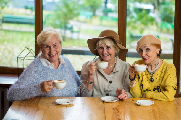 istock Women with coffee smiling. 639985300