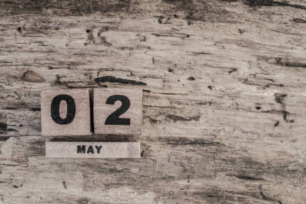 istock Cube calendar for may on wooden background 639985860