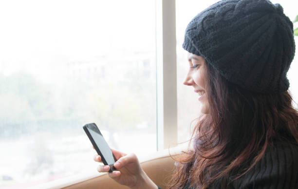 istock Woman texting on phone 639985936