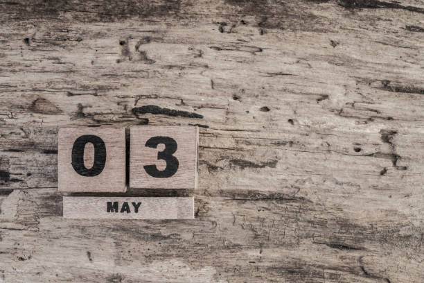 istock Cube calendar for may on wooden background 639985996