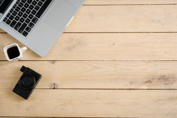 istock Wooden desk with various gadgets and accessories 639987296